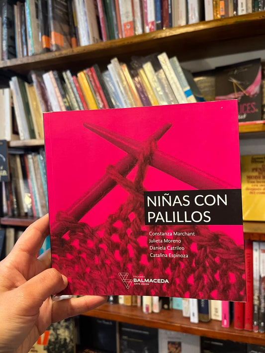 Niñas con palillos